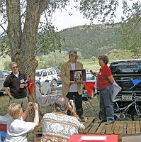  Giuliano presented the commemorative bell to Dawson Association Chairwoman, Ann Salvo Weybrew.

With the help of the Dawson Association, Giuliano learned that his grandfather, Teridano diTella is buried at the Mt. Calvary Cemetery in Raton, NM and that the grandfather of the mayor of San Pietro Avellana, Antonio diLudovico, is buried here at the Dawson Cemetery.
